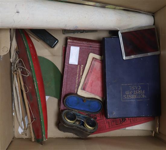 A postcard album, cigarette cards, opera glasses and sundries